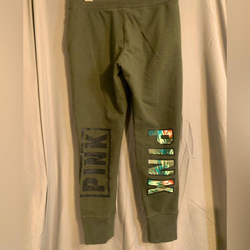 V.s.  Pink.  Olive green sweatpants